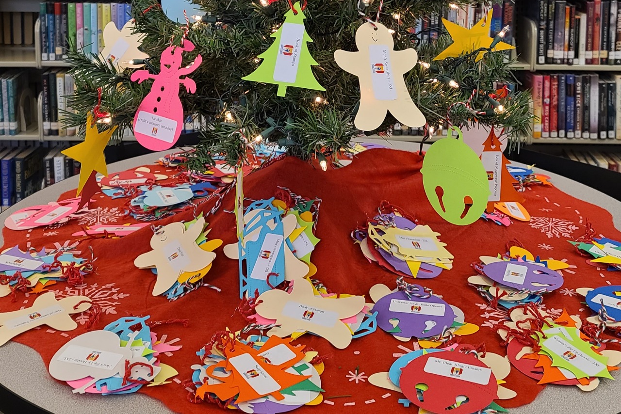 Christmas tree decorated with homemade paper ornaments